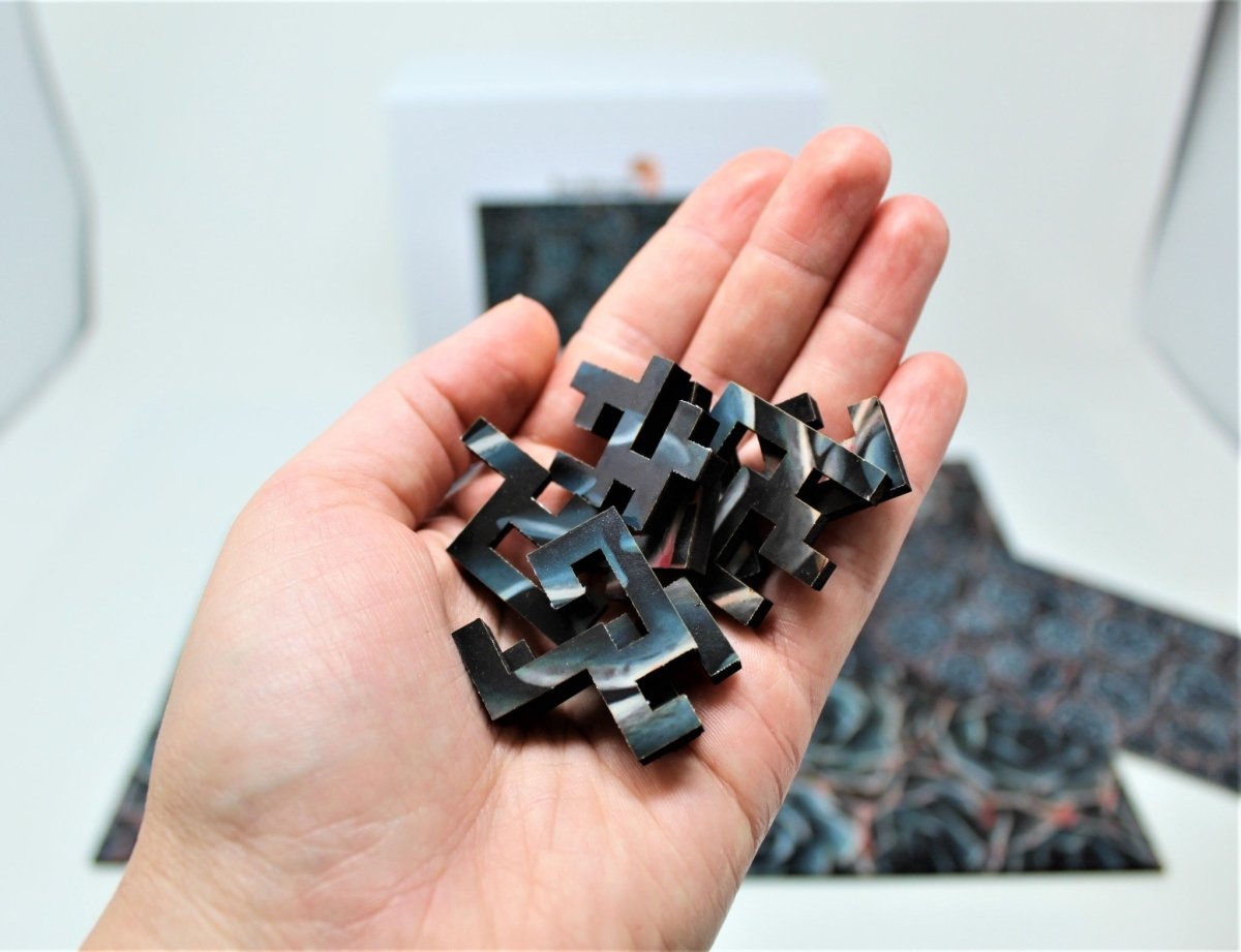Echeveria geometric wooden jigsaw puzzle by Bewilderness, closeup of a few pieces
