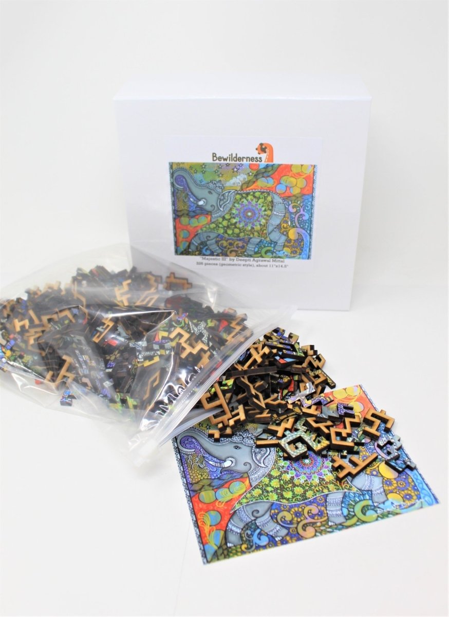 Majestic III colorful puzzle with elephant, by Deepti Designs and Bewilderness, bag of puzzle pieces and box