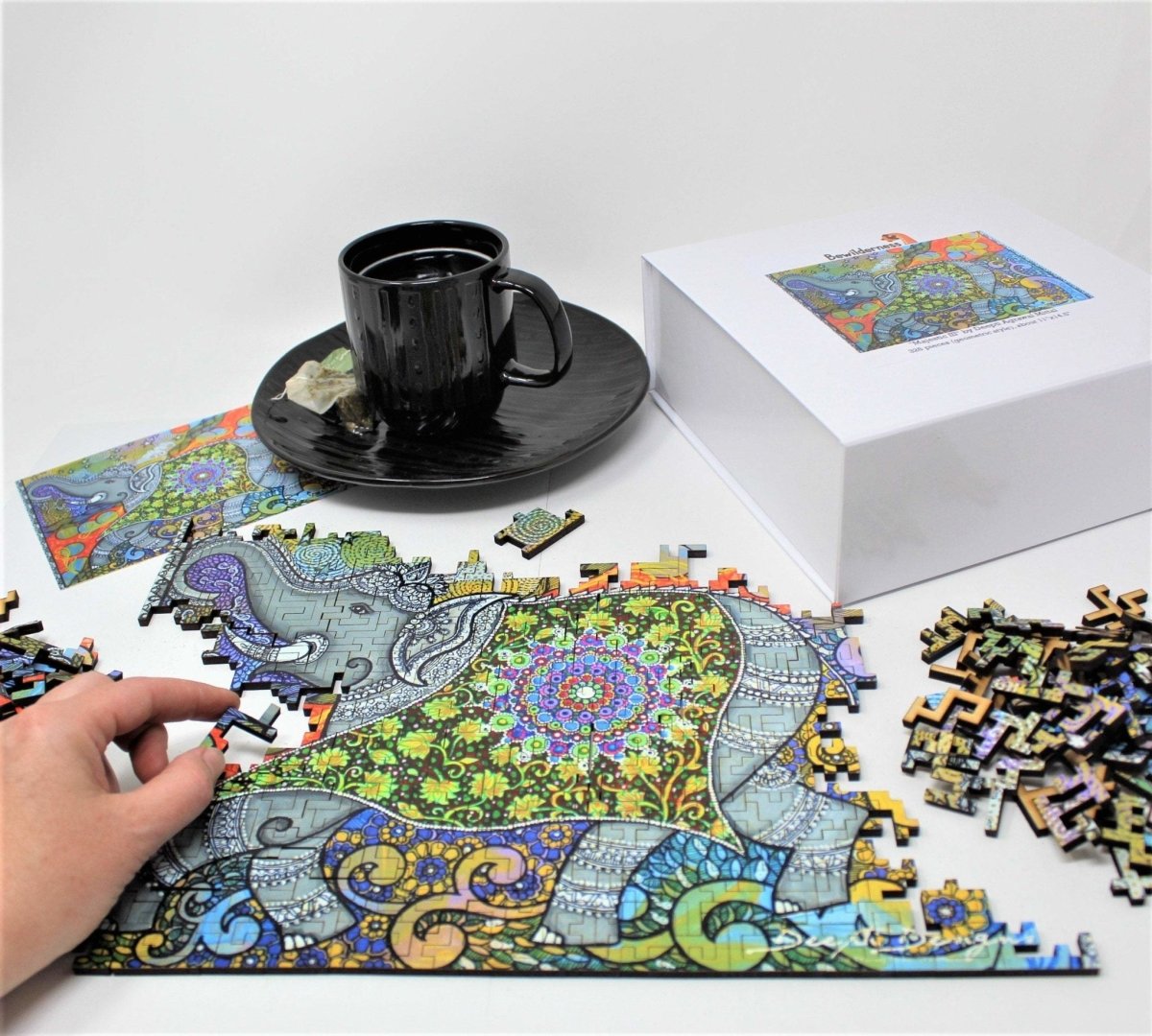 Majestic III colorful puzzle with elephant, by Deepti Designs and Bewilderness, puzzle in progress of assembly