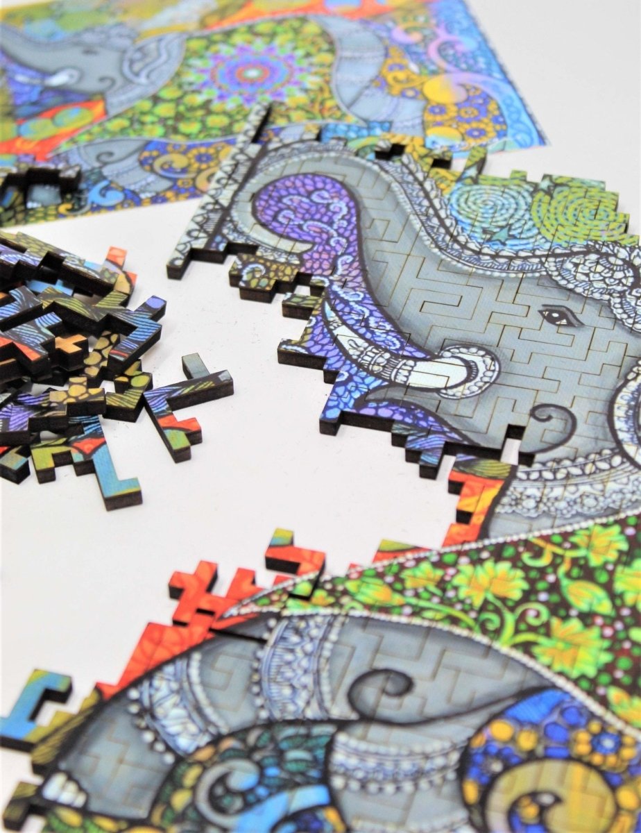 Majestic III colorful puzzle with elephant, by Deepti Designs and Bewilderness, close-up of a partially-assembled section